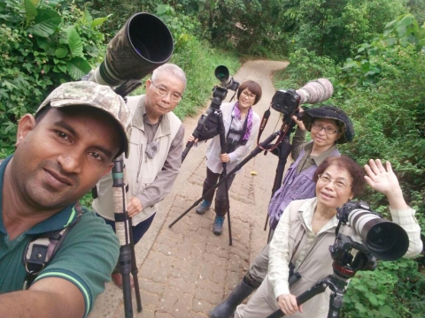 Zoe and group with Thilina birdwatching